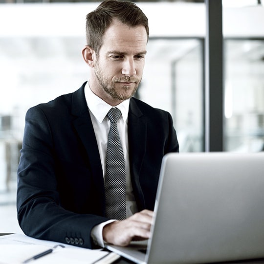 man working with his laptop