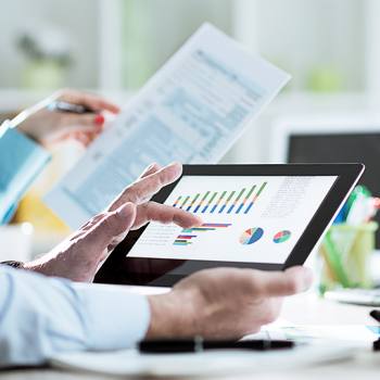 close up of typing on a tablet