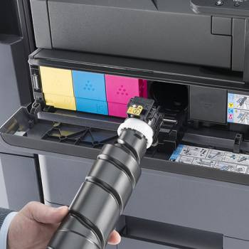toner being inserted into a Kyocera printer