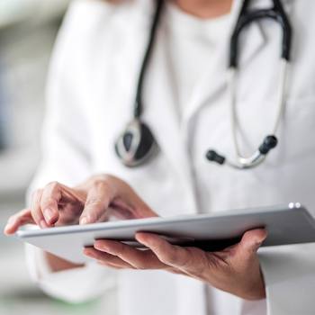 Automation: The Future of Work hands tablet